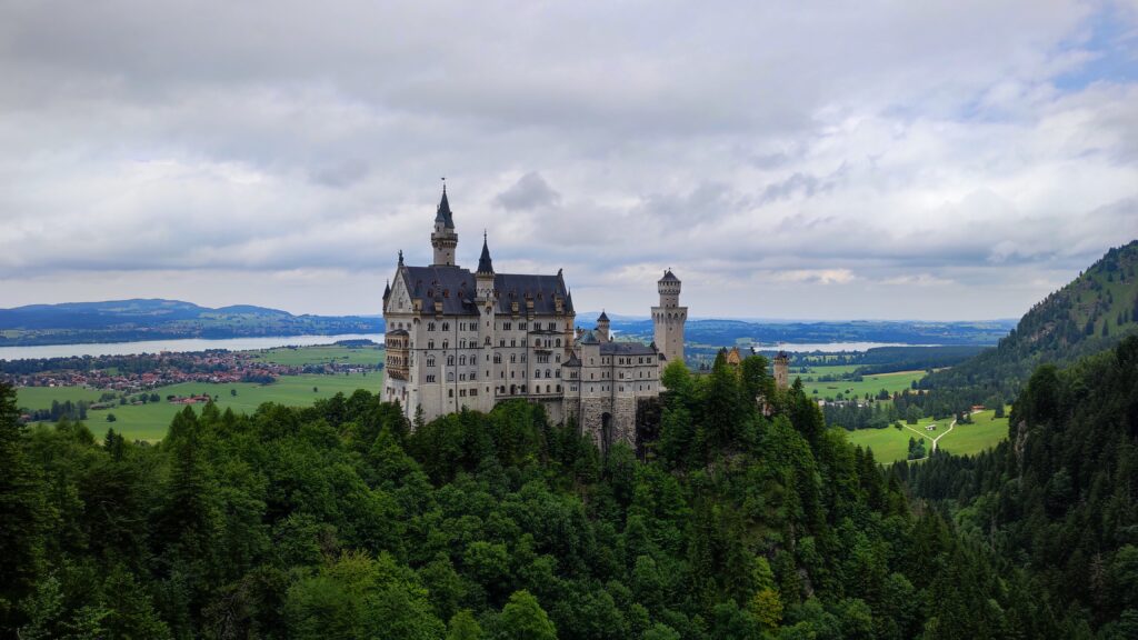 Astoundingly True - A view of Neuschwanstein Castle from the Marienbrucke bridge